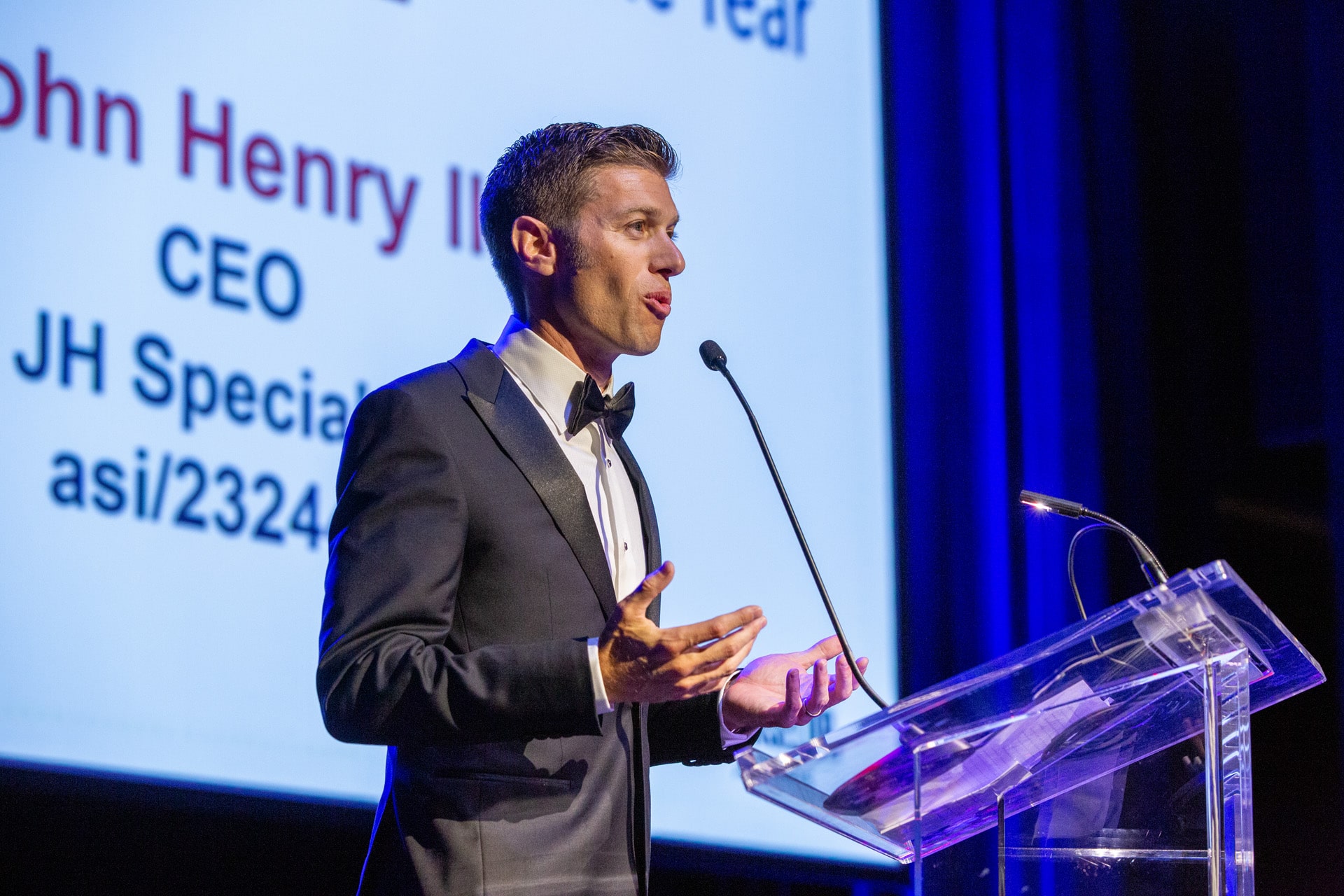 John Henry accepting Entrepreneur of Year Award 