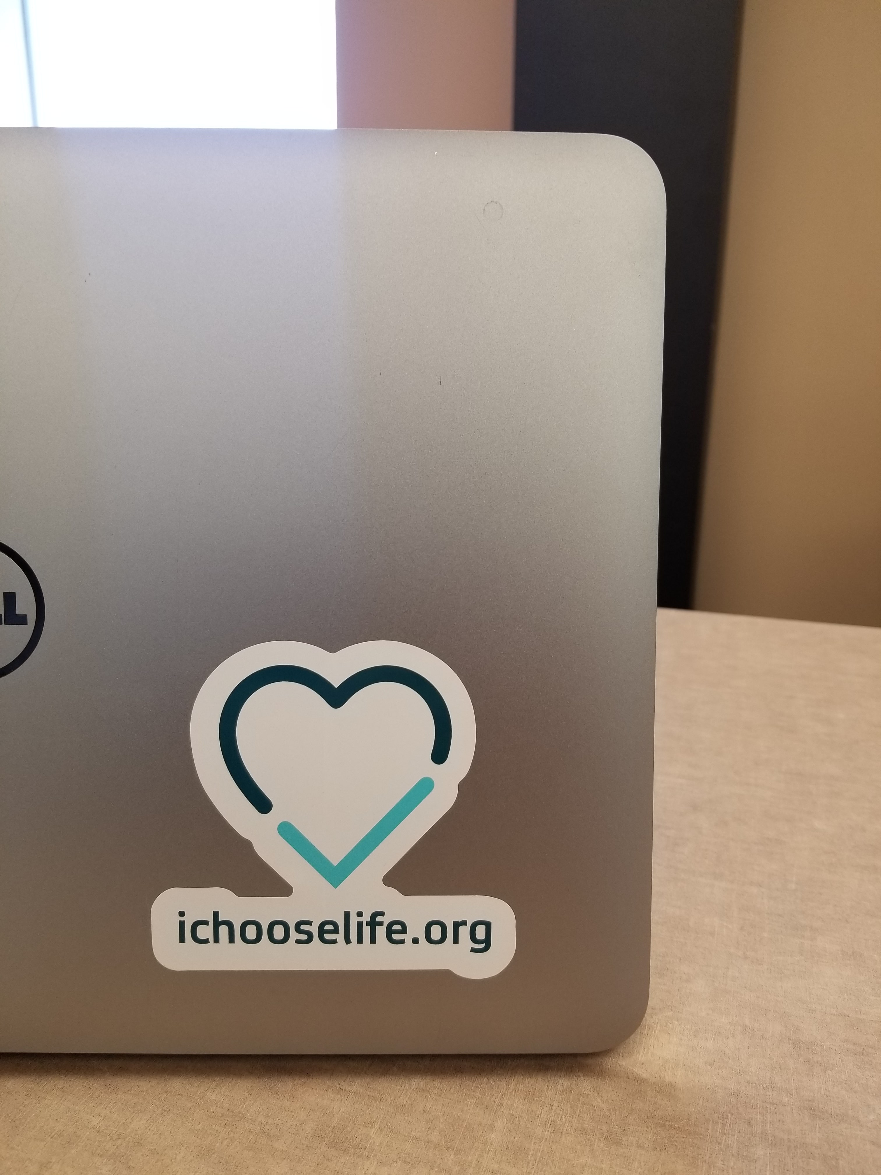 Sample decal shown on a laptop