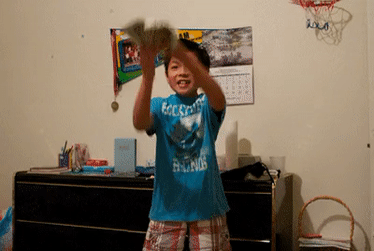 Kid Throwing Money In The Air