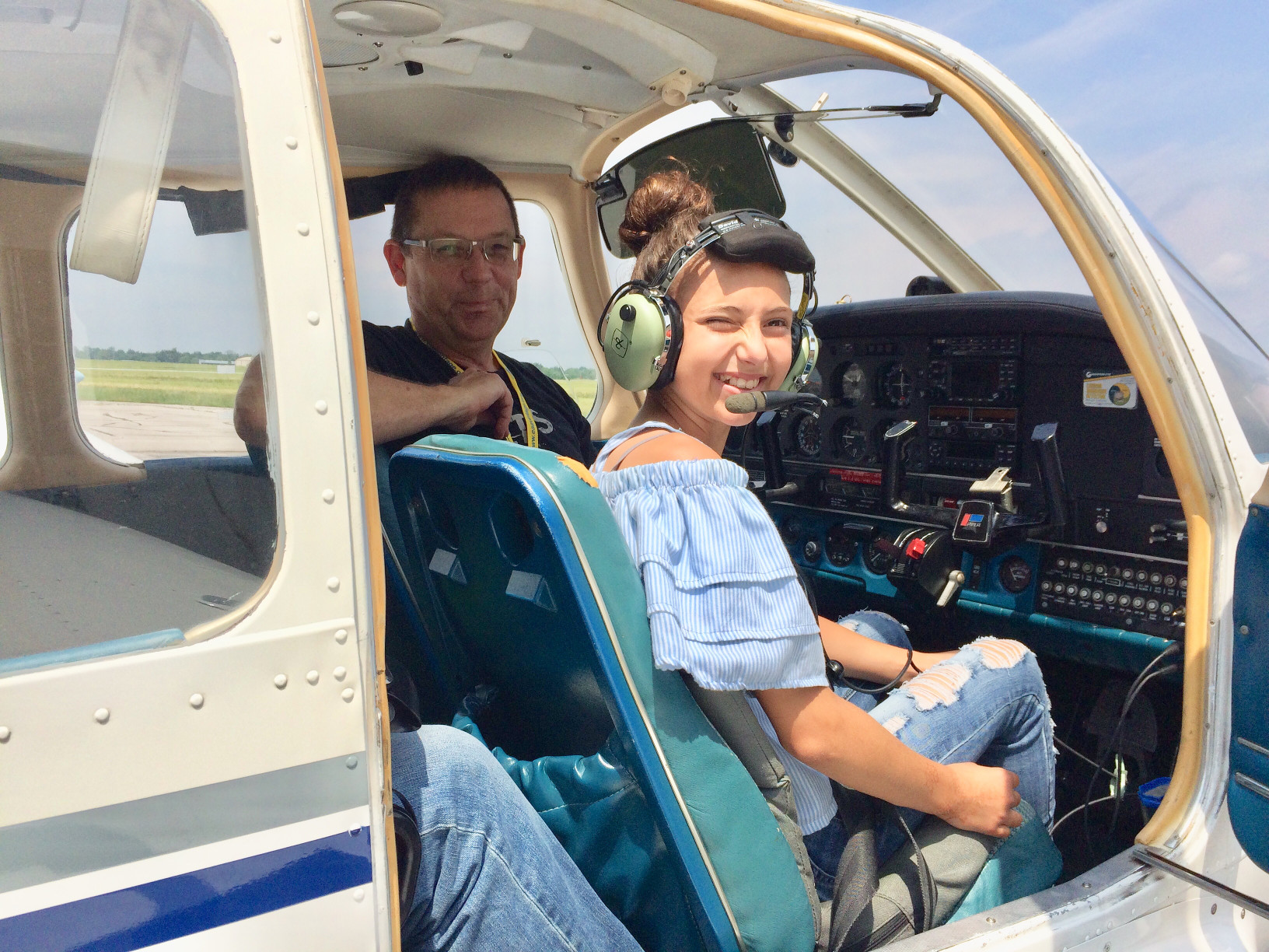 Flight Instructor and Student in Airplane 