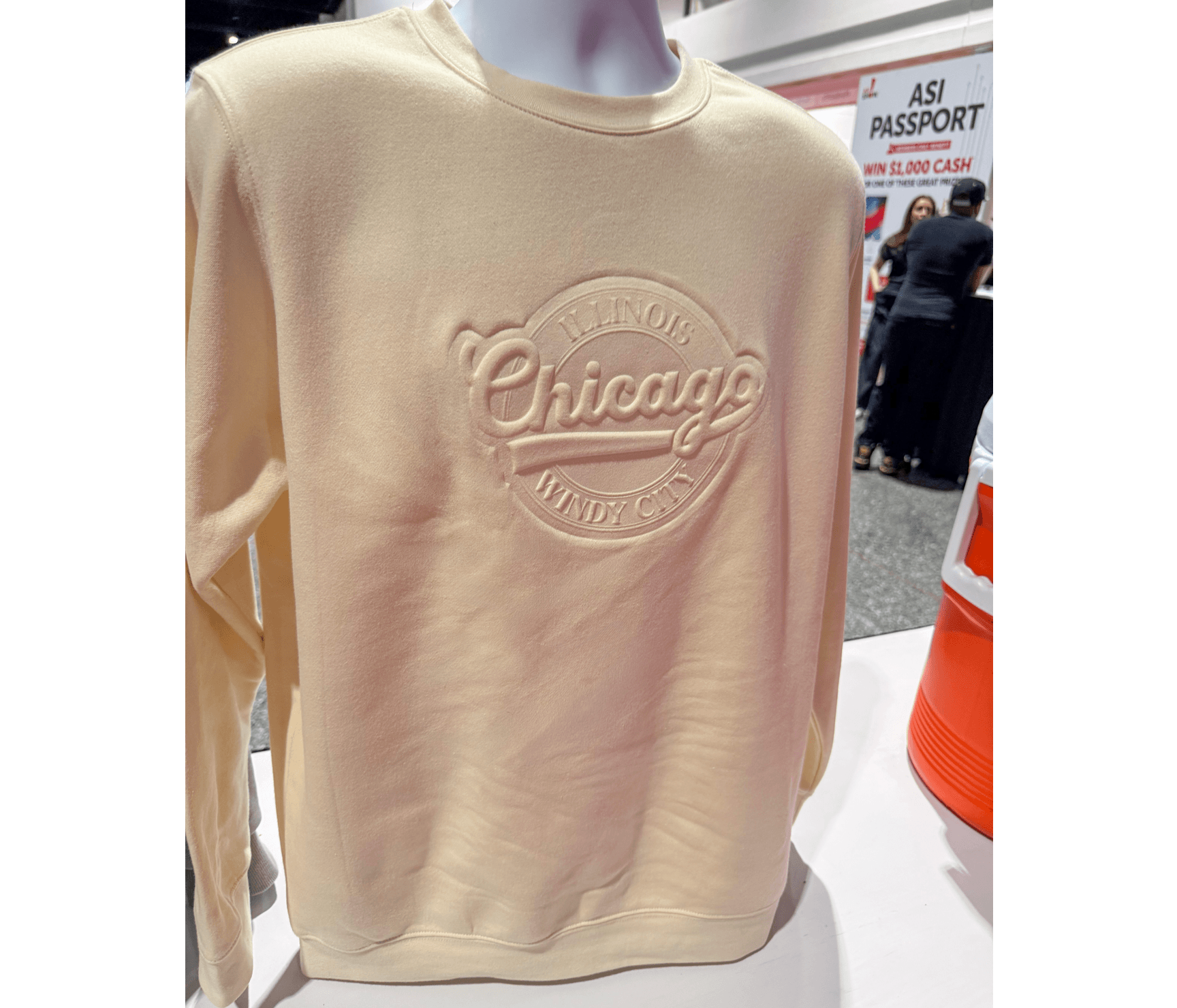 Embossed Chicago on cream colored crewneck sweatshirt