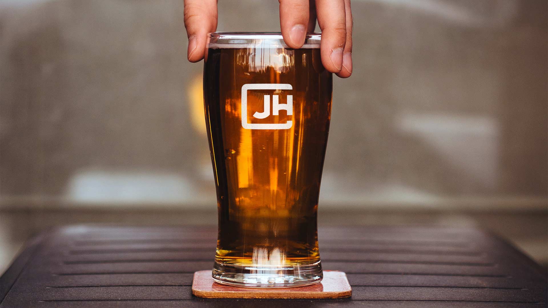 Sample pint glass with JH logo